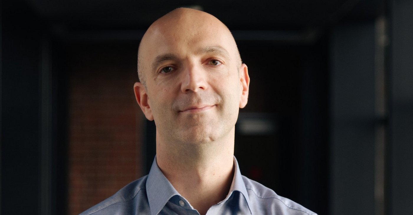 Prof. Dr Jonas Schmidt-Chanasit: a balding researcher wearing a light blue shirt.