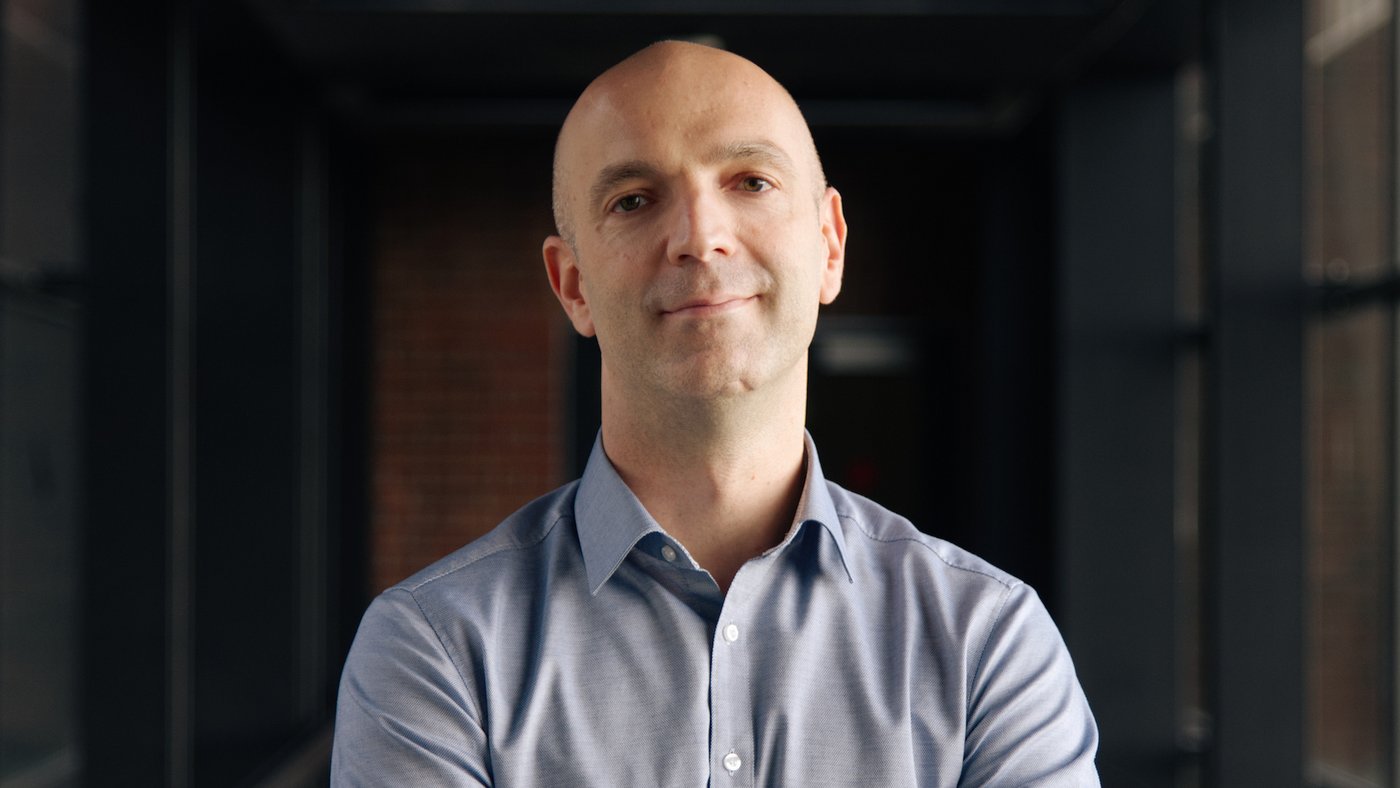Prof. Dr Jonas Schmidt-Chanasit: a balding researcher wearing a light blue shirt.